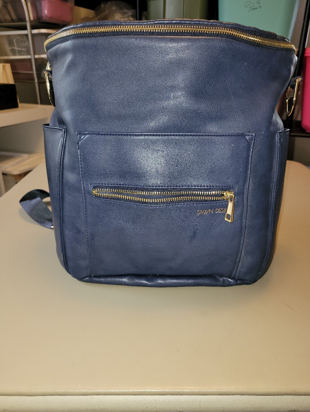 Fawn Design - Blue Bag/ Backpack Diaper Bag.  Multi-pocketed Good Condition!
